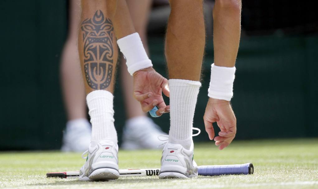 Il tatuaggio di Rosol sul polpaccio sinistro. Reuters